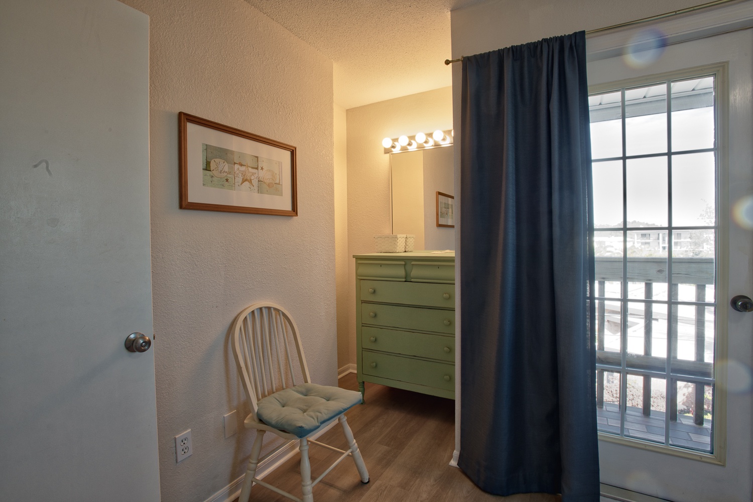 Queen bedroom on the 3rd floor has a small balcony