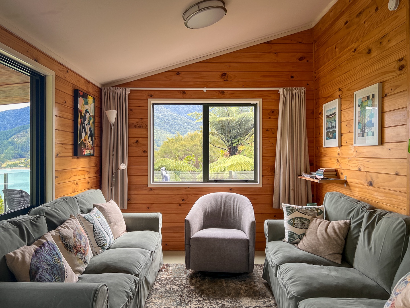 Sink into plush sofas surrounded by warm timber walls as you gaze through large windows at stunning mountain and forest views.