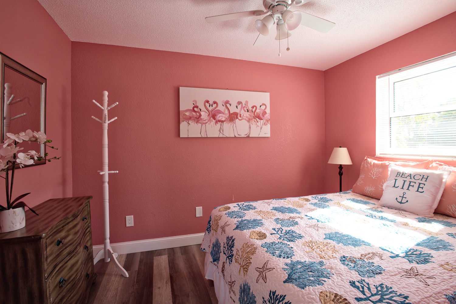 Queen bedroom on the second floor with entry located off the main living room