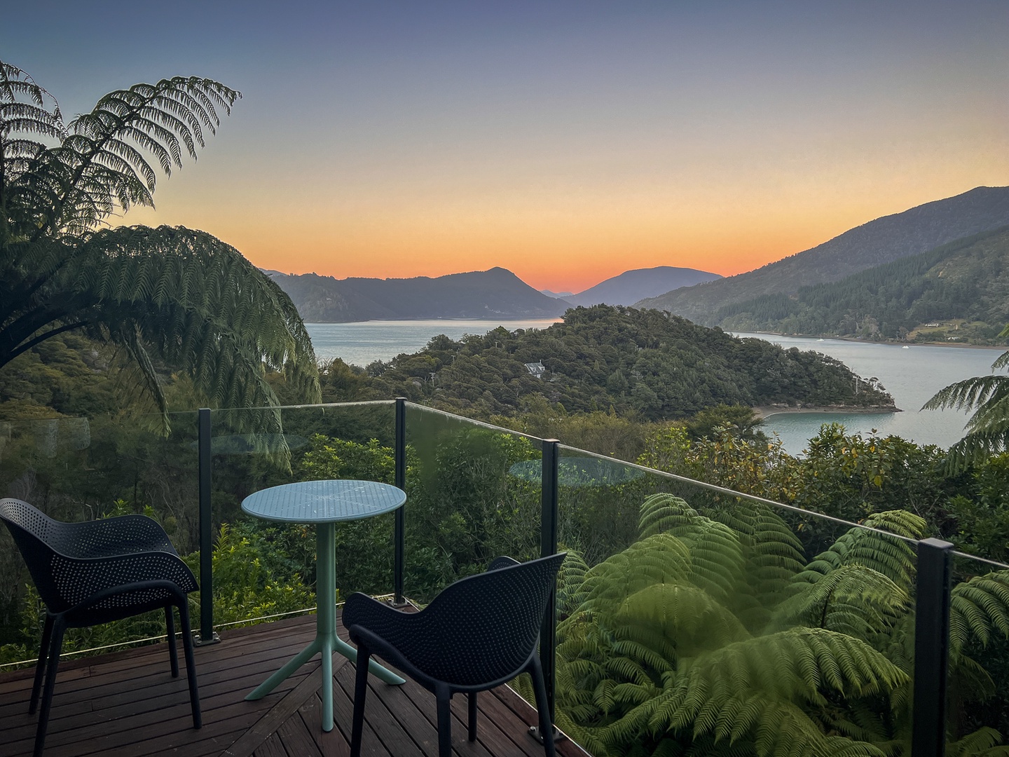 Sip your morning coffee on this stunning deck overlooking pristine waters and rolling hills, where every sunrise paints the perfect backdrop for your getaway.