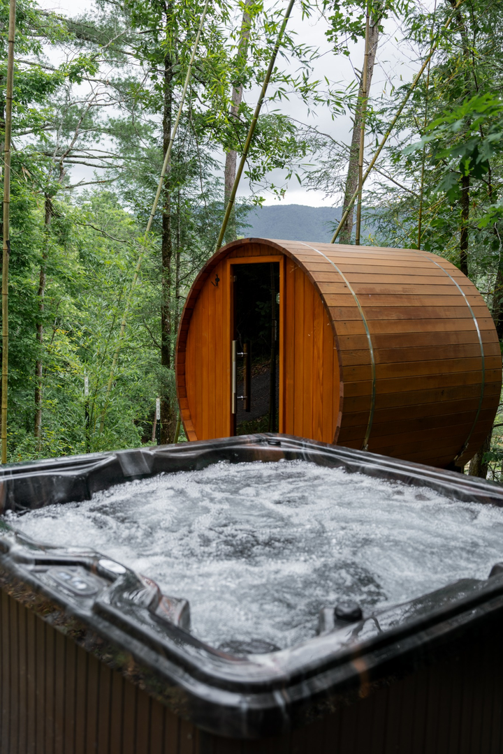 Hot tub and Sauna nested in the woods