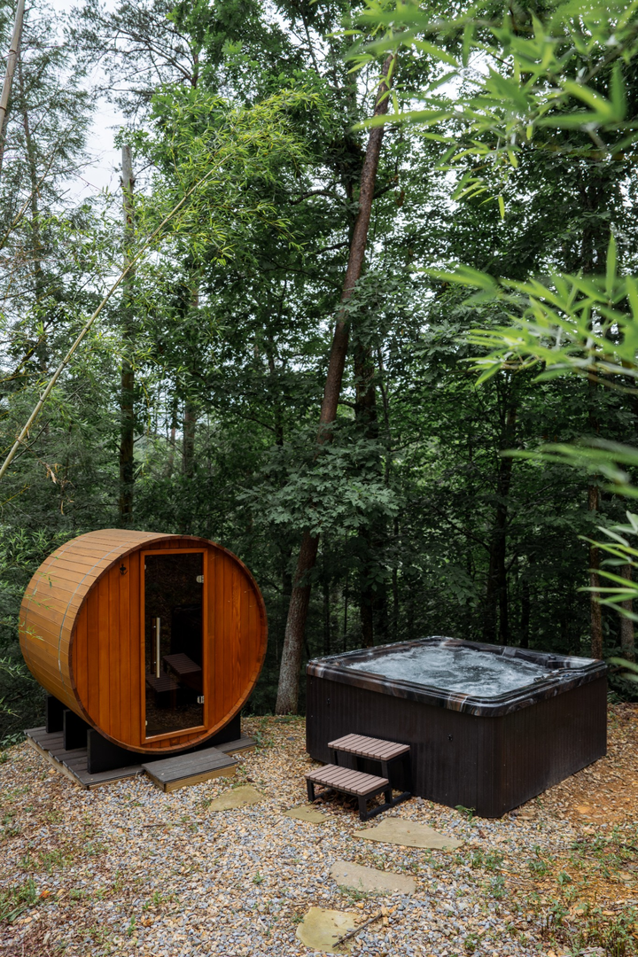 Hot tub and Sauna nested in the woods
