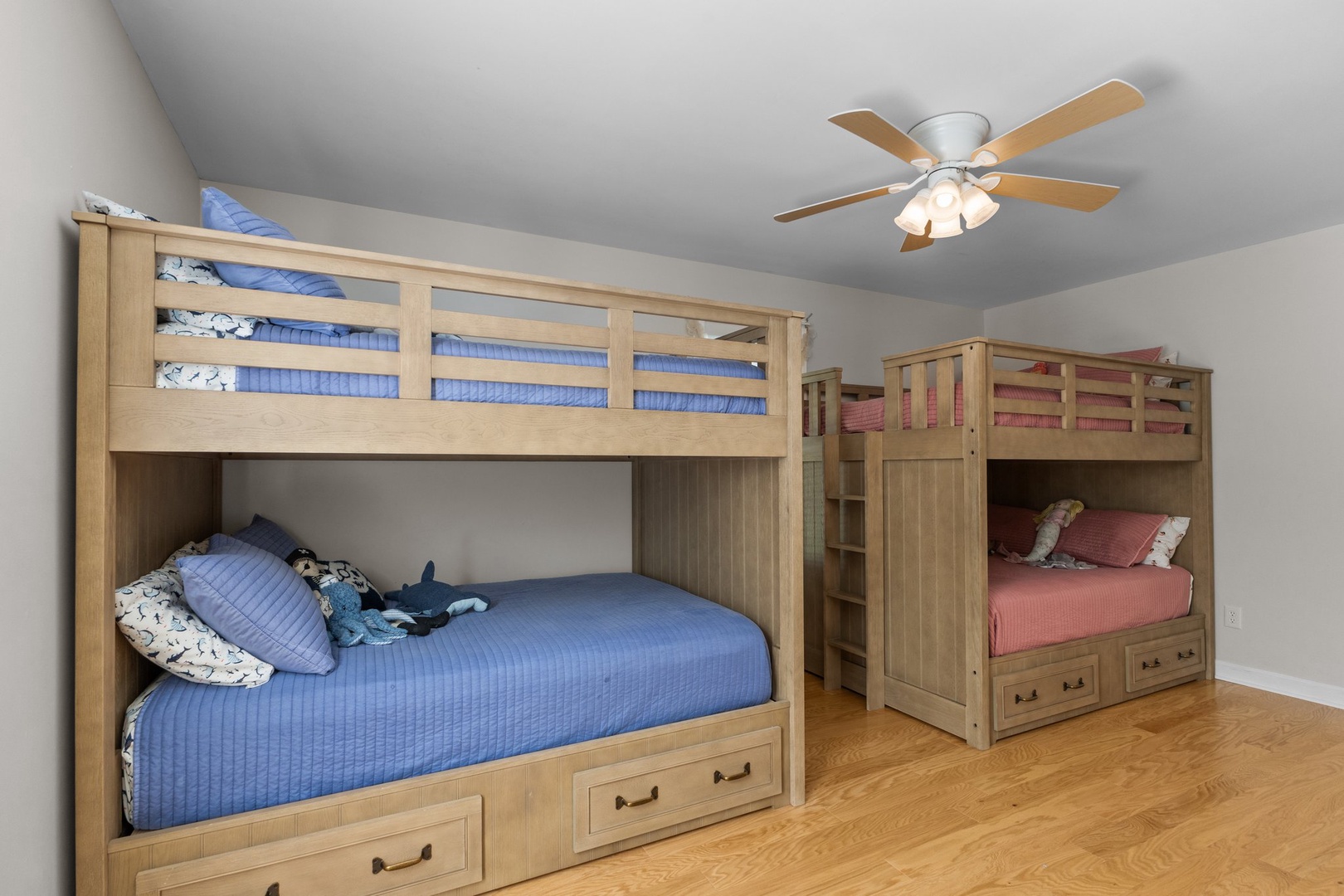 Your kids will love these sturdy wooden bunk beds with built-in storage drawers underneath, perfect for family adventures.