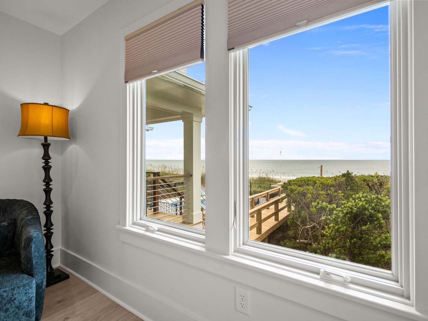 Wake up to stunning ocean views from your window, where natural light fills your space and endless blue horizons await.