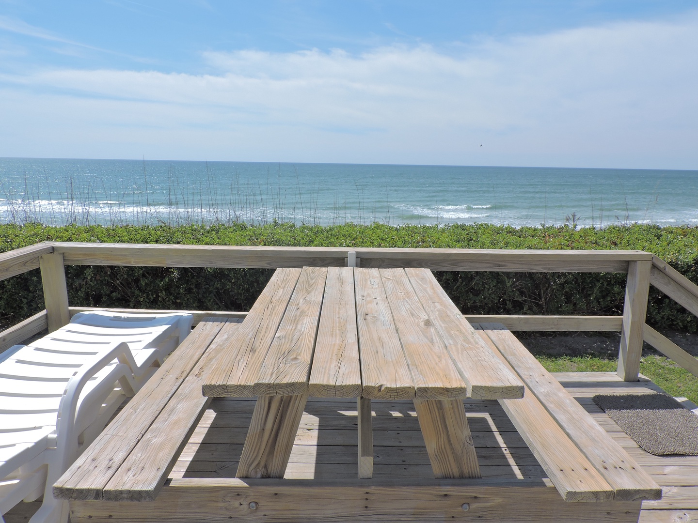 Enjoy ocean breezes and endless sea views from your private deck with picnic table—perfect for morning coffee or evening meals.