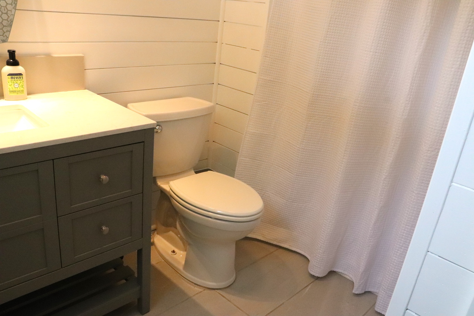 Refresh in your private bathroom featuring a stylish vanity, clean fixtures, and thoughtful touches like quality toiletries.