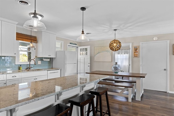 Gather around this stunning kitchen island where you'll create memories over morning coffee and family meals together.