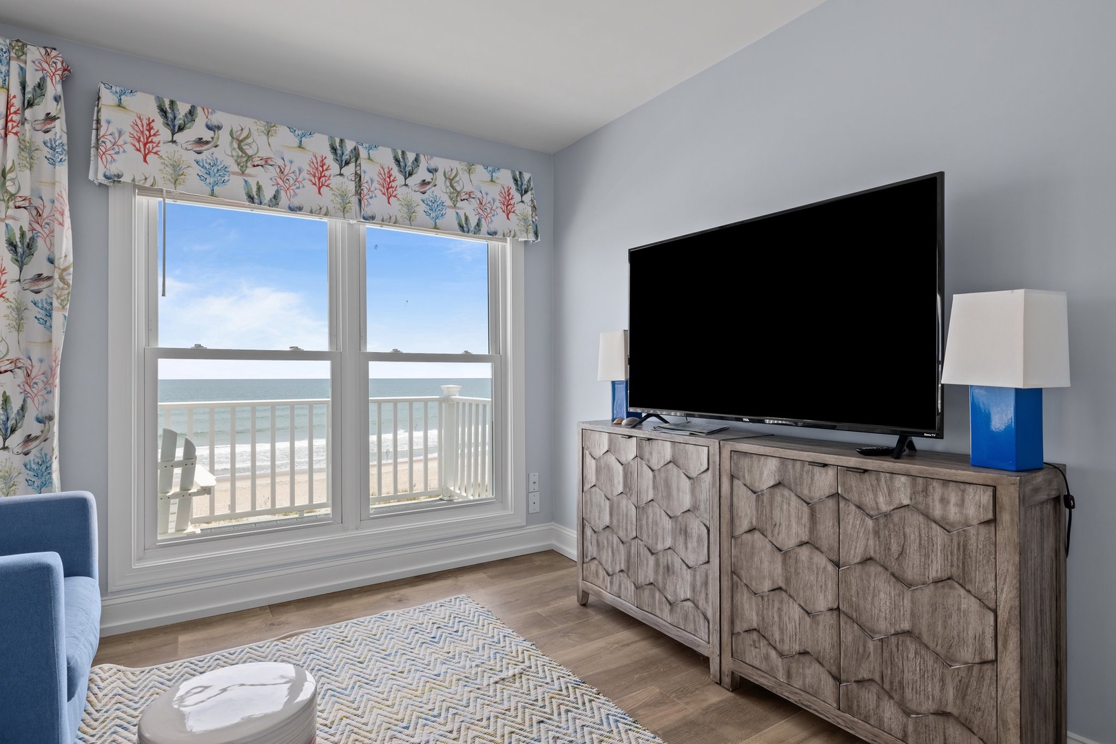 Unwind in your coastal retreat with stunning ocean views and modern entertainment for perfect beach vacation relaxation.