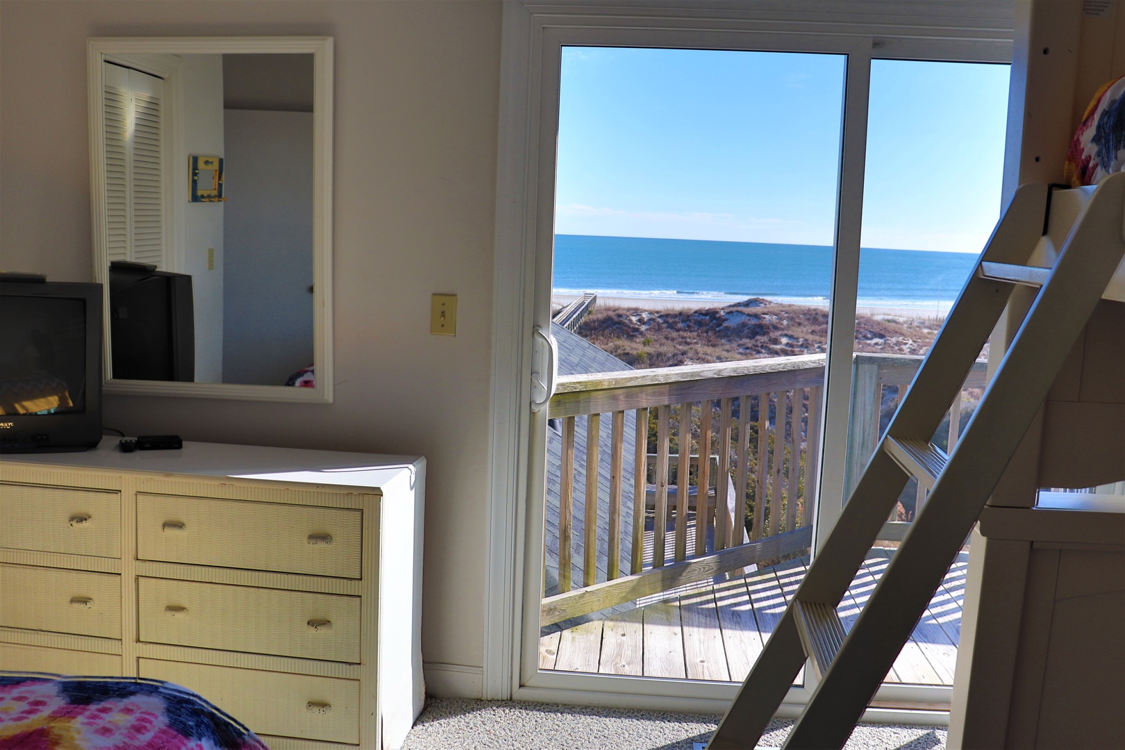 Wake up to breathtaking ocean views from your cozy bedroom, where you can step onto your private balcony and breathe in the sea air.
