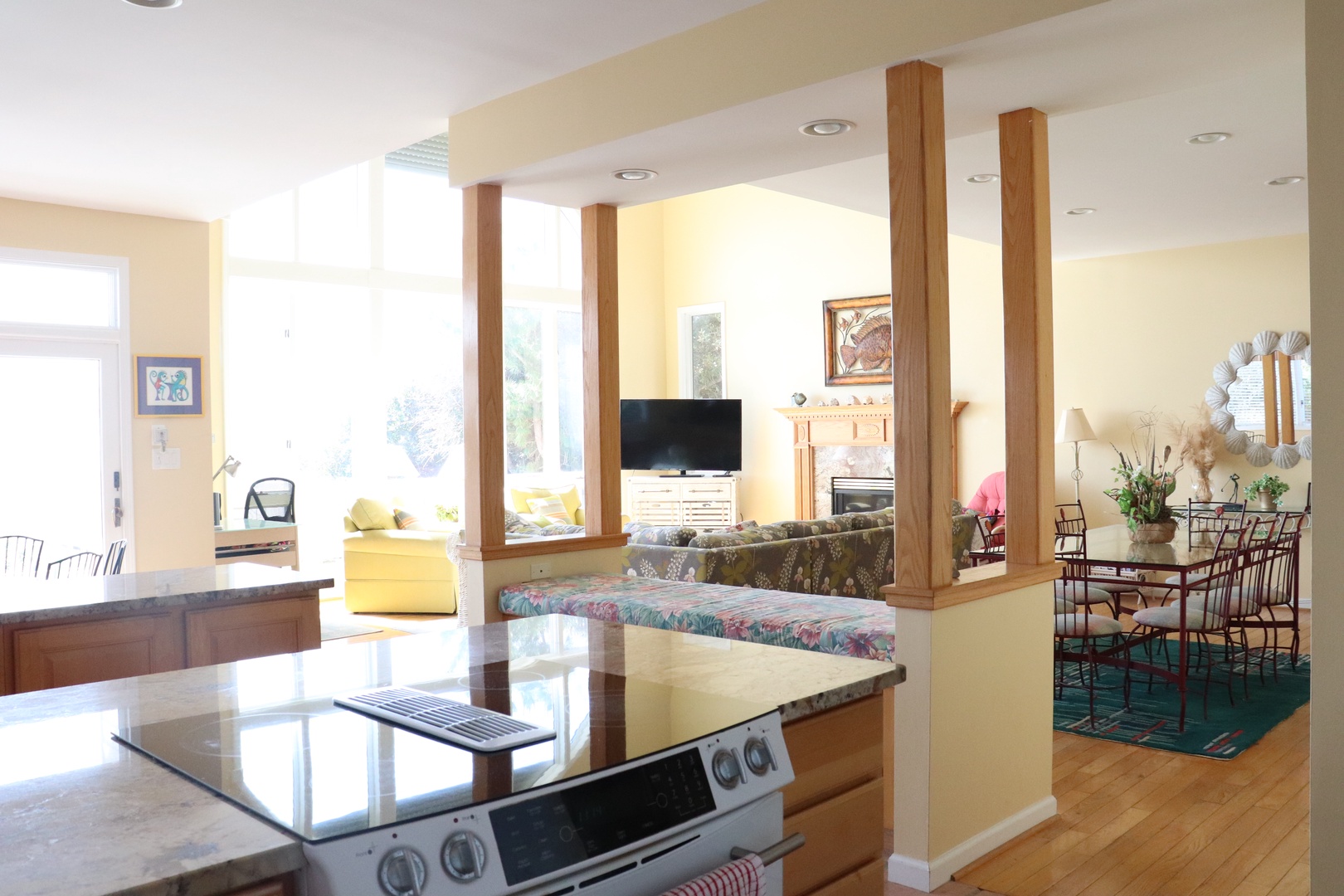 Your open-concept kitchen flows seamlessly into the bright living space, perfect for cooking while staying connected with your travel companions.