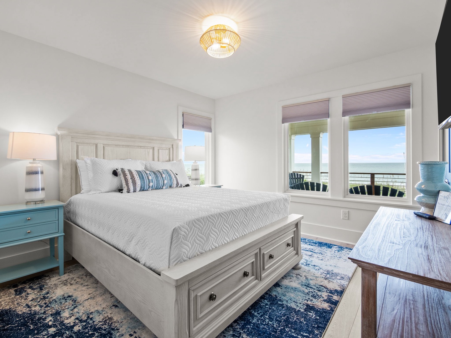 Wake up to stunning ocean views from your serene bedroom, where coastal breezes and natural light create the perfect seaside retreat.