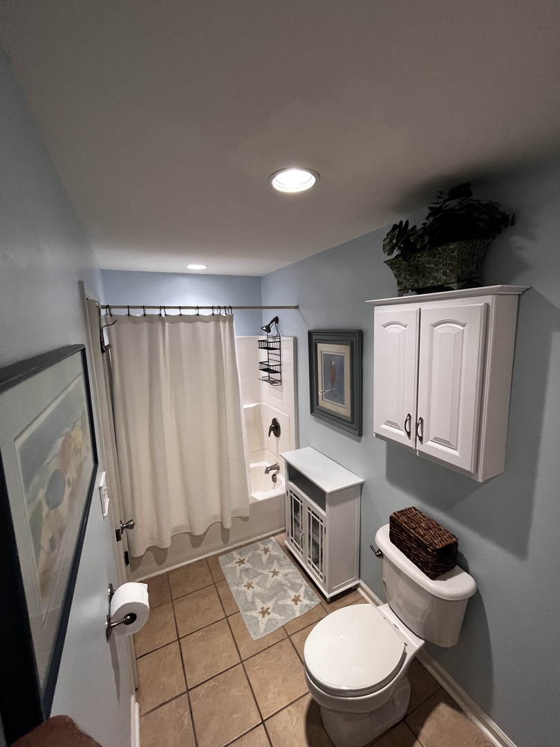 Your private bathroom features a relaxing soaking tub, modern fixtures, and thoughtful touches like soft towels and natural light.