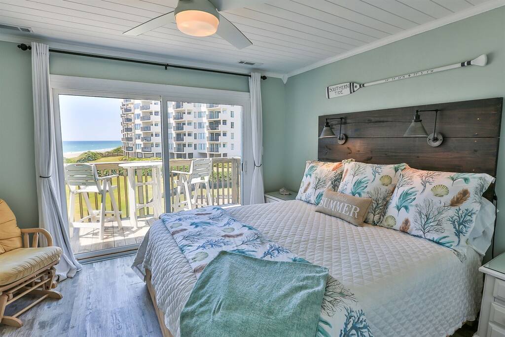 Wake up to stunning ocean views from your coastal bedroom, where soothing colors and beach-inspired decor create the perfect retreat.