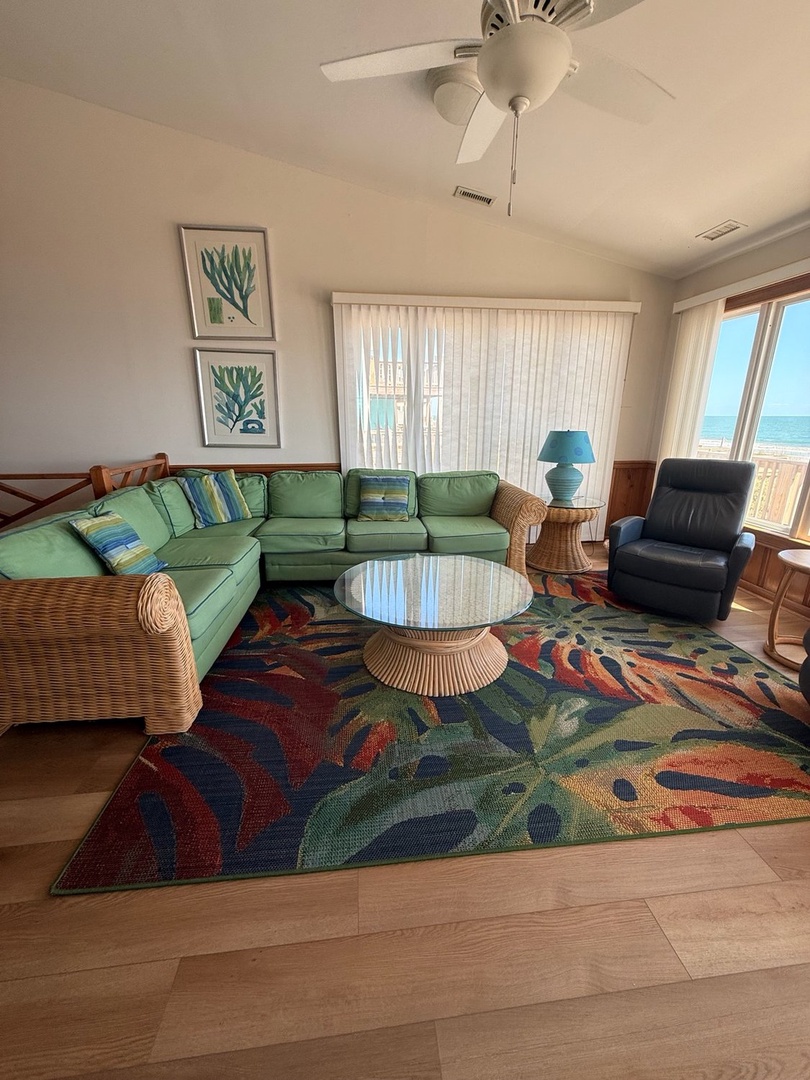 Sink into plush seating and watch the waves roll in through your windows—your personal oceanfront retreat awaits with stunning sea views and coastal charm.