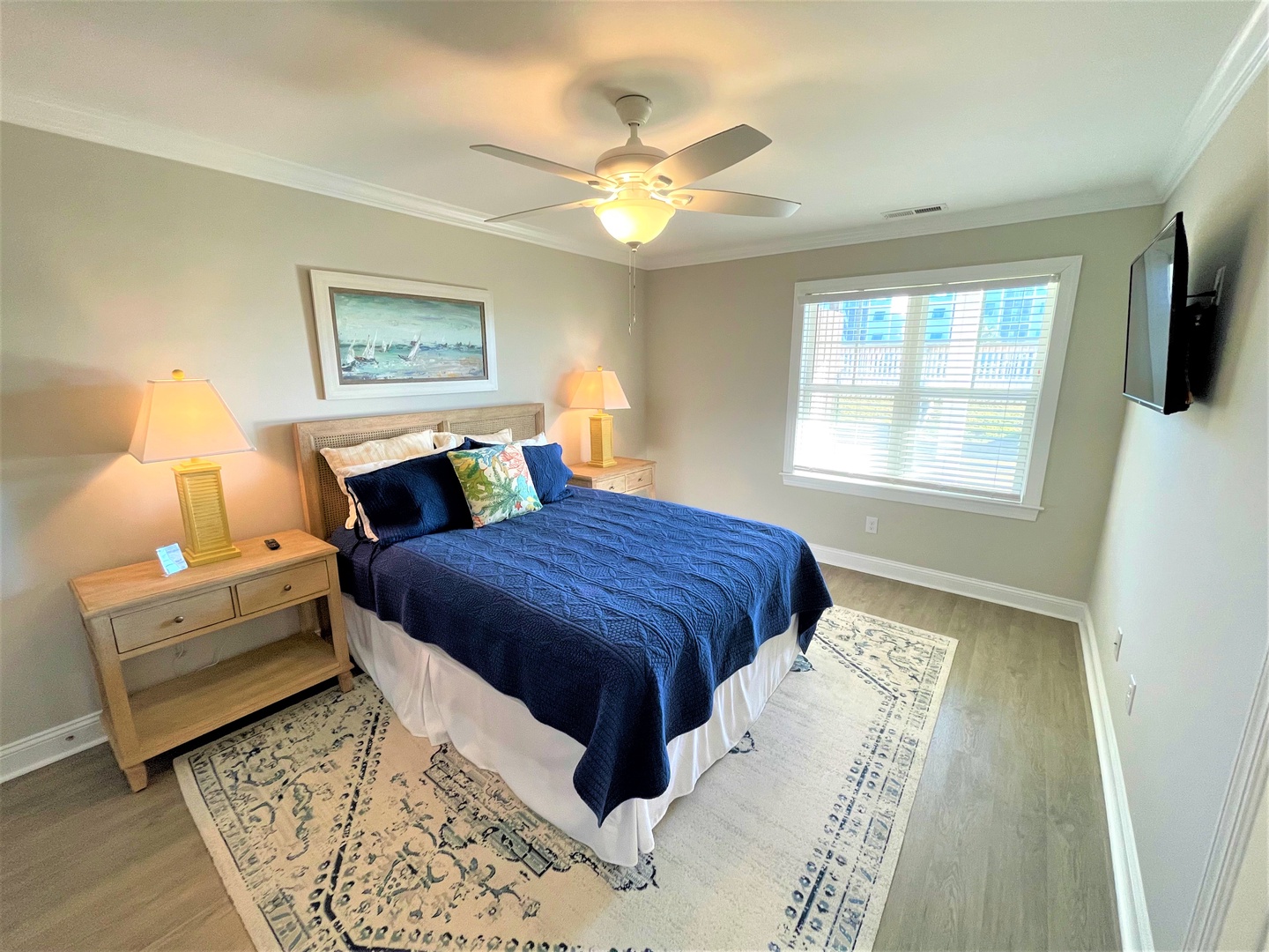 Drift off in comfort on crisp linens while gentle coastal breezes flow through your serene retreat, complete with thoughtful nautical touches.