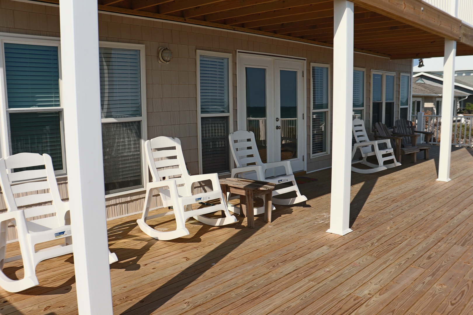 Relax in comfort on your private deck with rocking chairs and peaceful views.