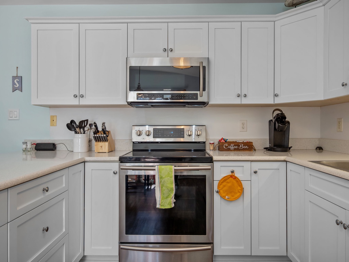 Your fully equipped kitchen features modern appliances and ample storage, perfect for preparing meals during your stay.