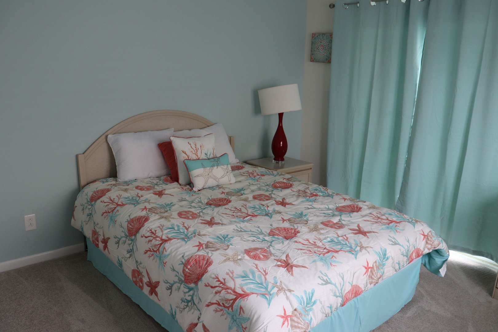 Drift off to dreamland in your coastal-themed bedroom, where ocean-inspired bedding and soothing aqua hues create the perfect seaside sanctuary.