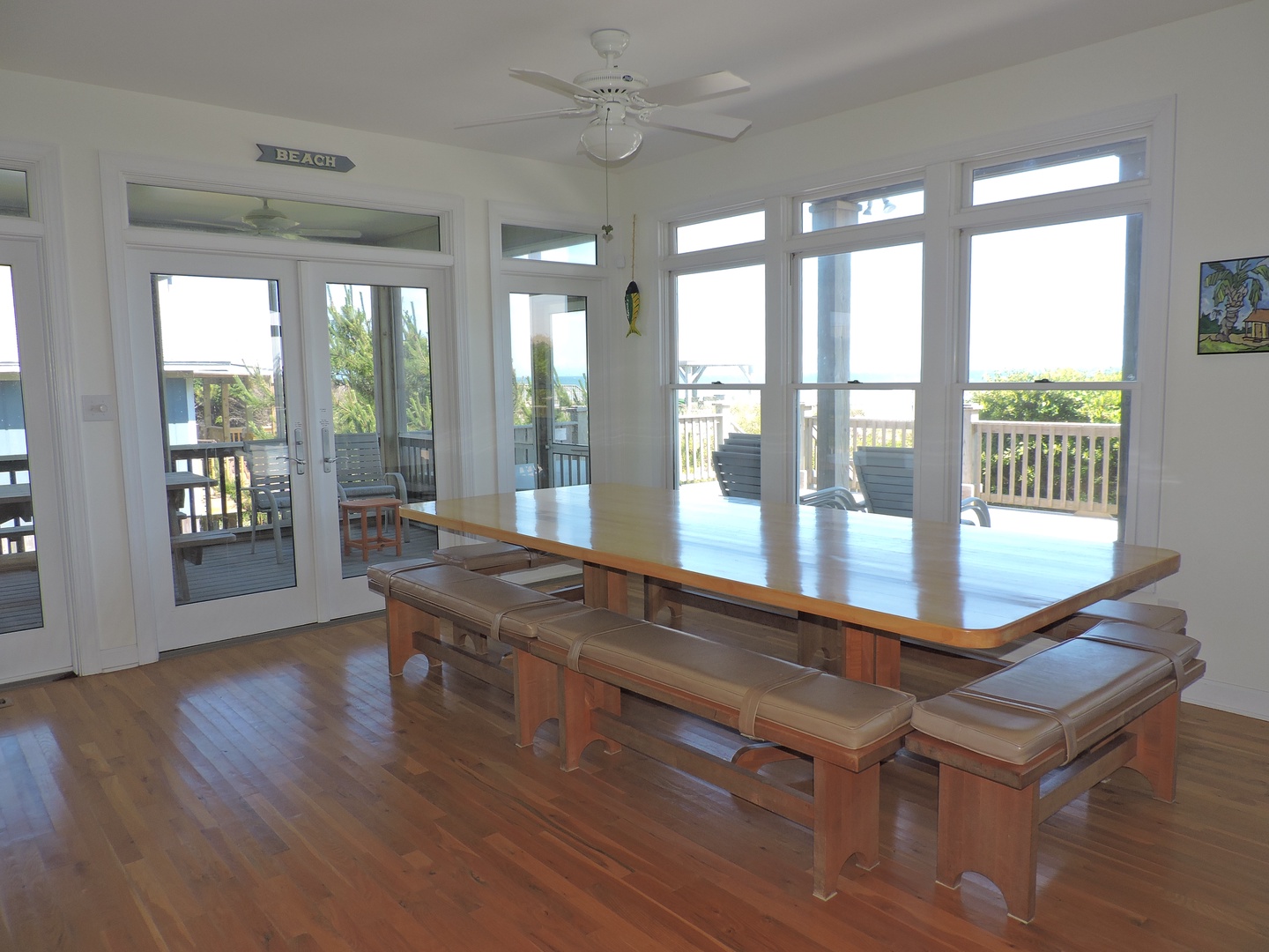 Your spacious dining room opens to a scenic balcony through elegant French doors, creating perfect indoor-outdoor flow for memorable meals.