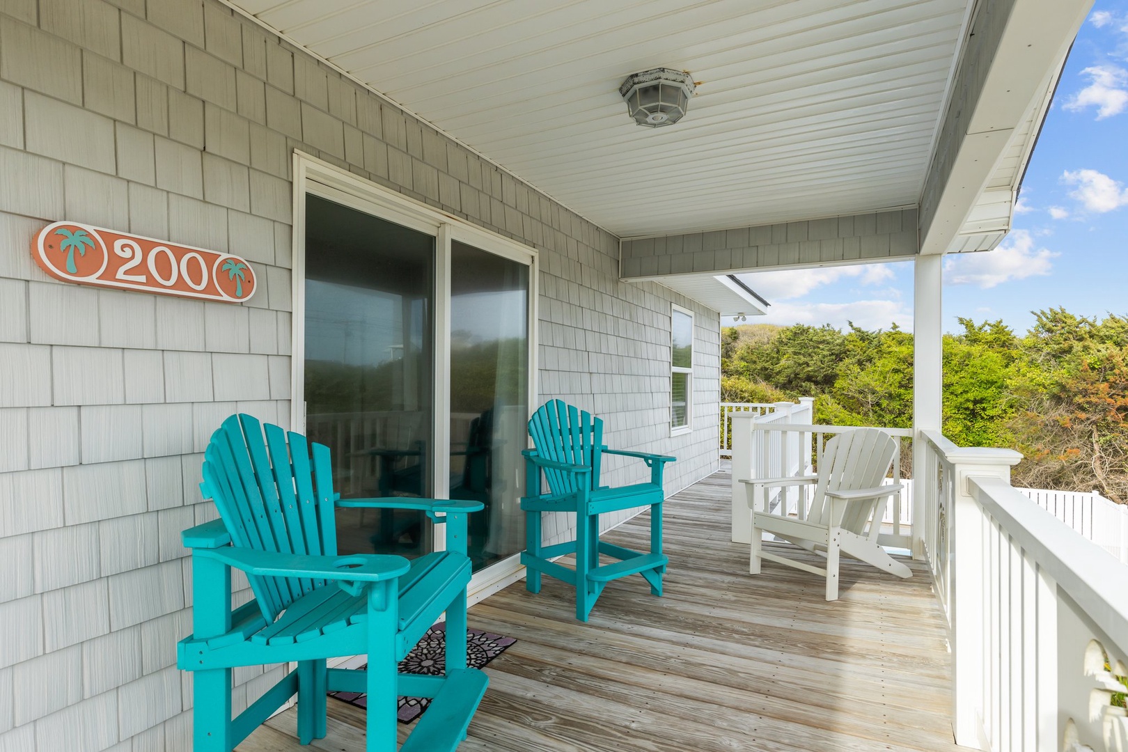 Relax in your private deck chairs while soaking up coastal breezes and tree-lined views.