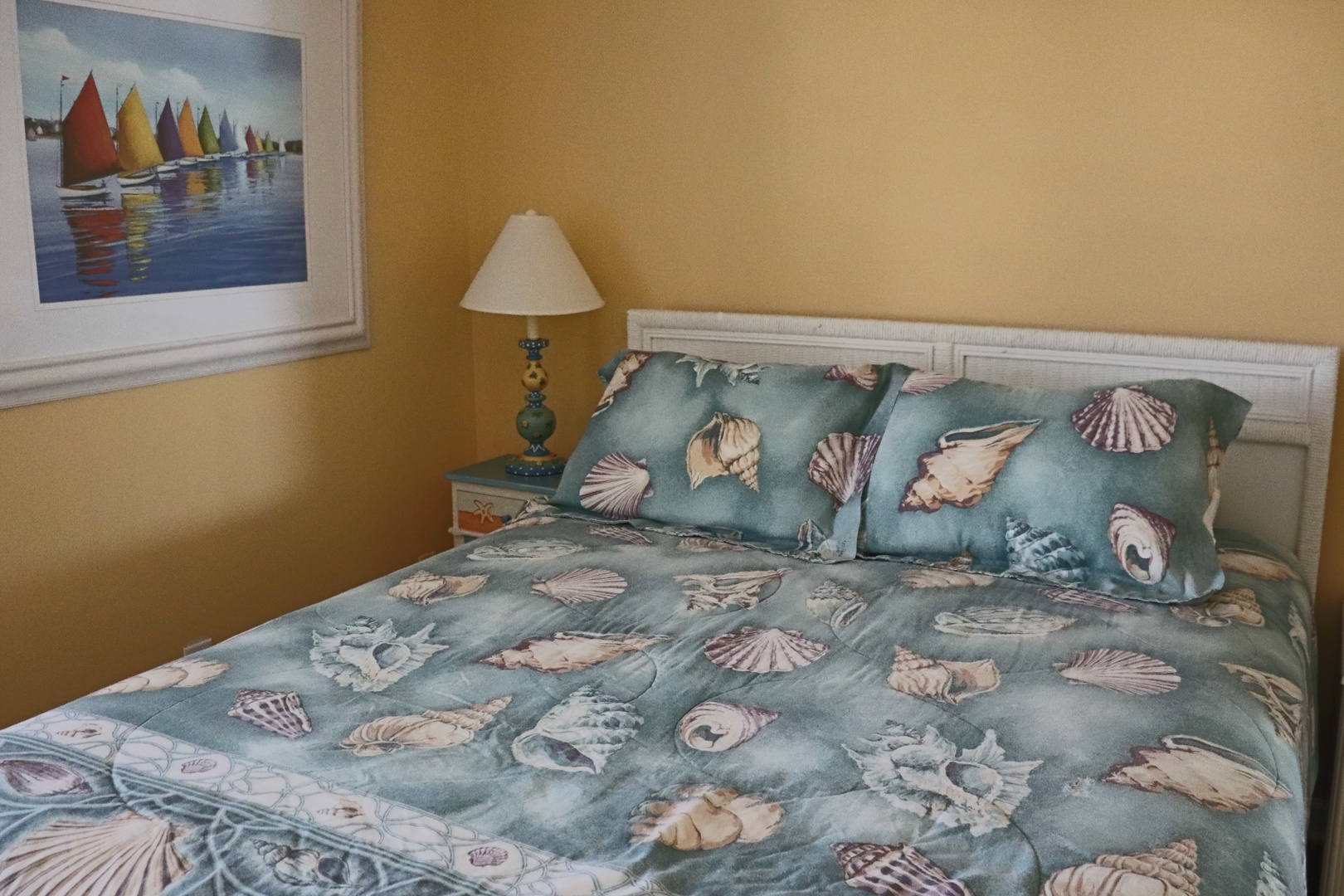Drift off to sleep surrounded by coastal charm with beautiful seashell bedding and nautical artwork creating your perfect seaside retreat.