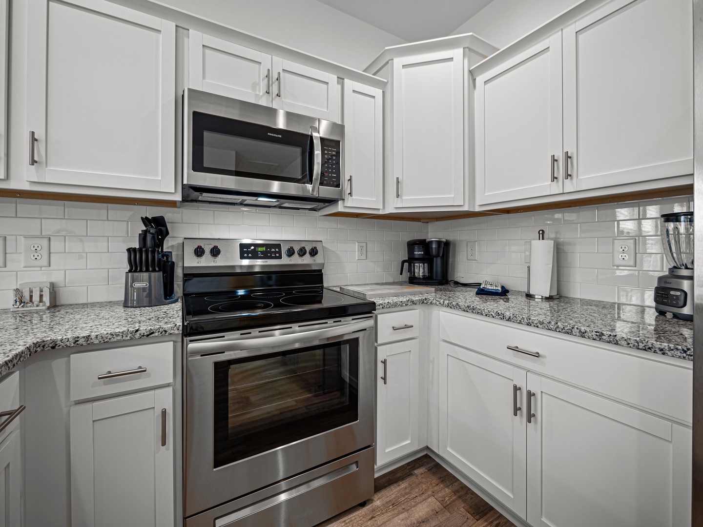 Your fully equipped kitchen features granite counters, stainless steel appliances, and all the essentials for preparing memorable meals during your stay.