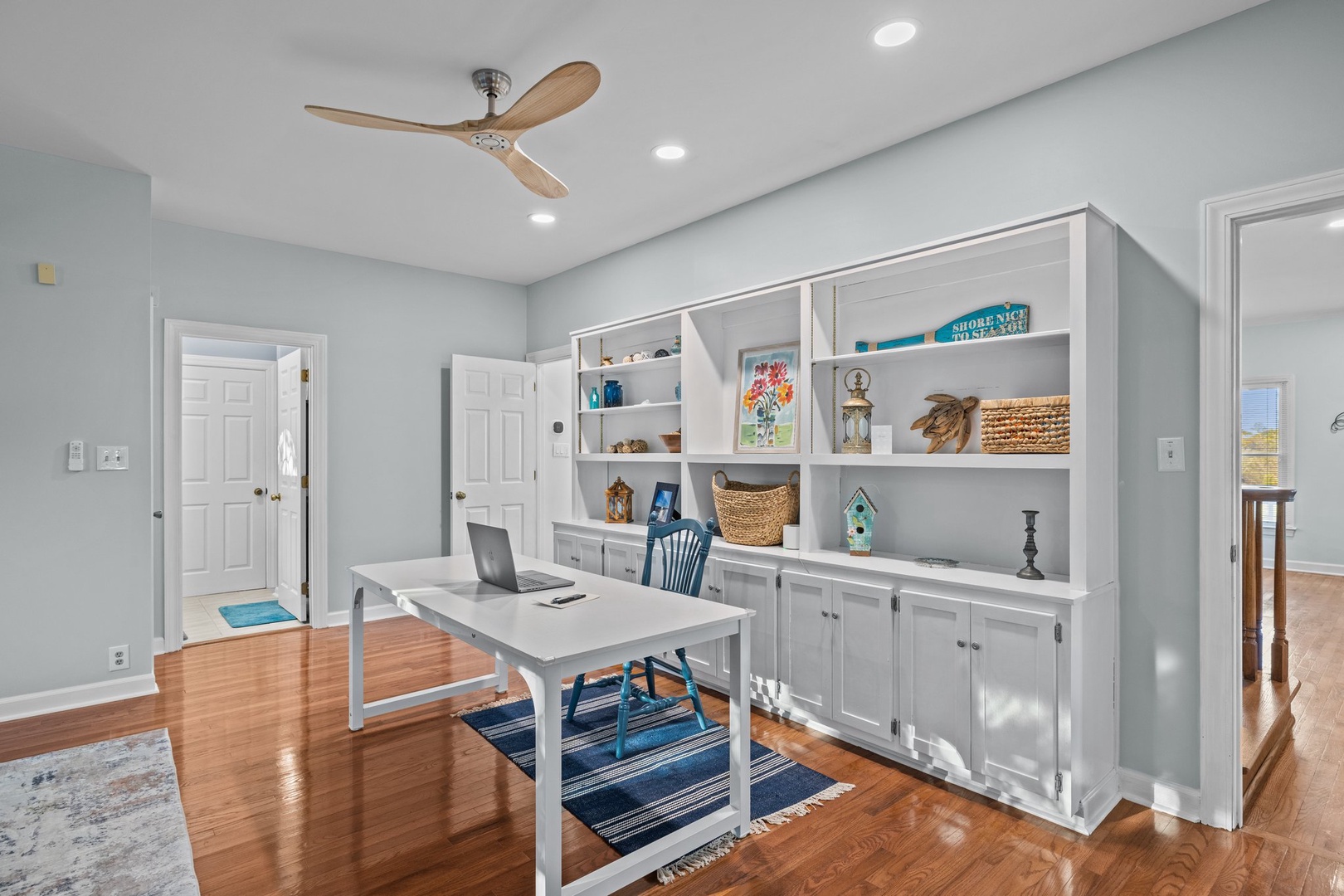 Your dedicated workspace features built-in shelving and a sleek desk where you can catch up on emails or plan your adventures.