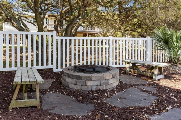 Gather around your private fire pit for cozy evenings under the oak canopy, where you'll create lasting memories with loved ones.