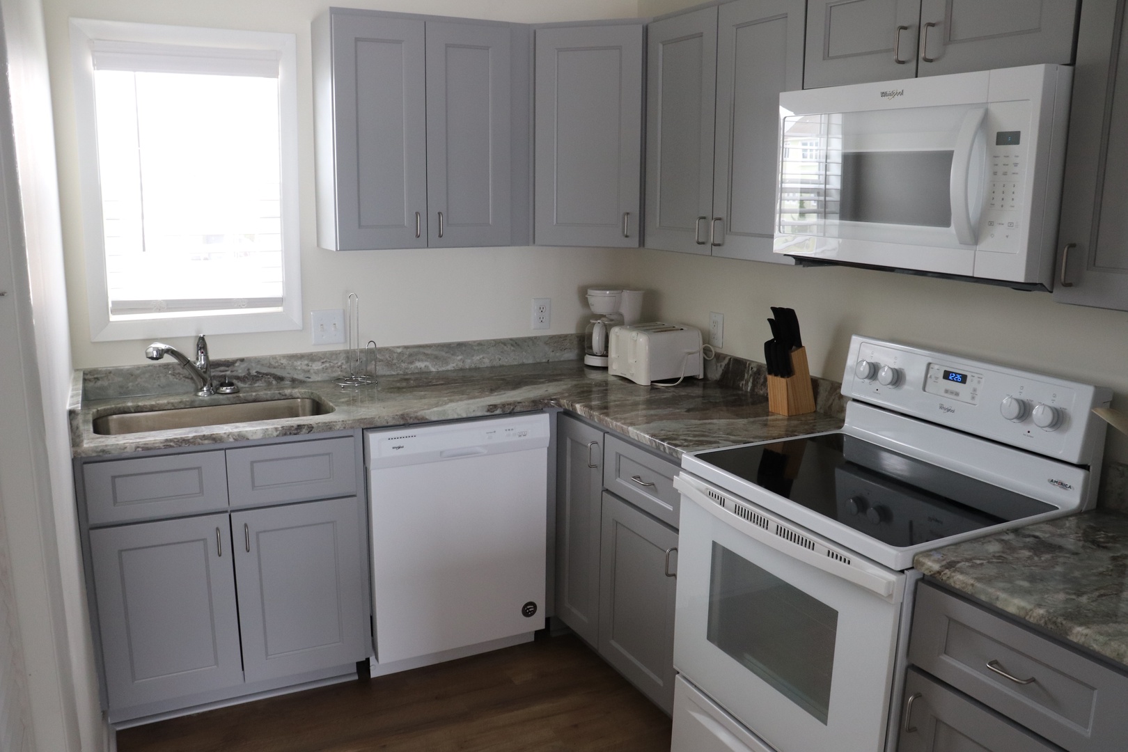 Your fully equipped kitchen features granite countertops, modern appliances, and everything you need to create delicious meals during your stay.