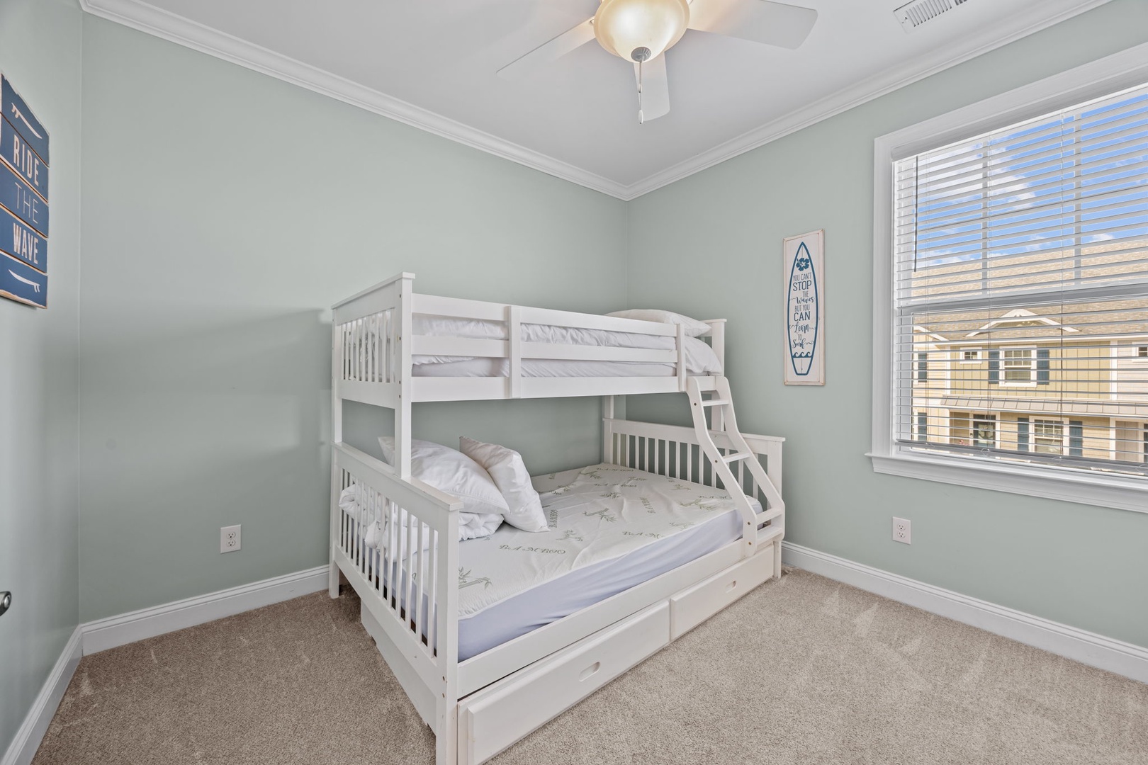 Your kids will love this cozy bunk room with twin-over-full beds and nautical touches, perfect for bedtime stories and morning adventures.