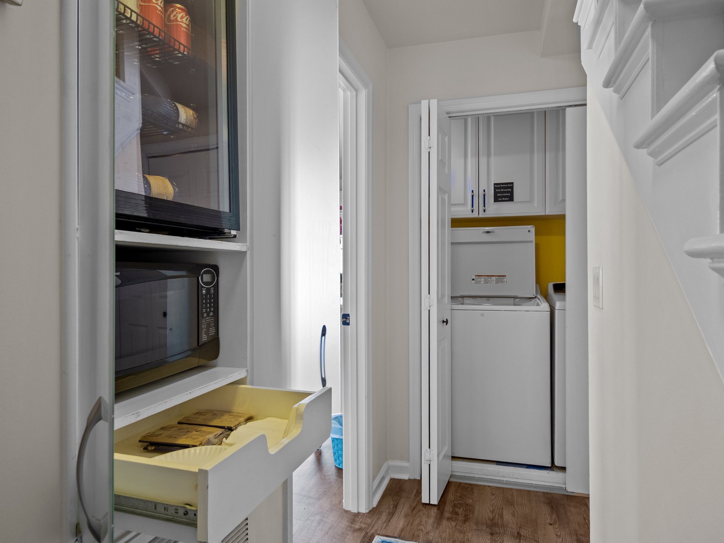 Your fully equipped kitchen includes modern conveniences with washer and dryer tucked away for extended stays.