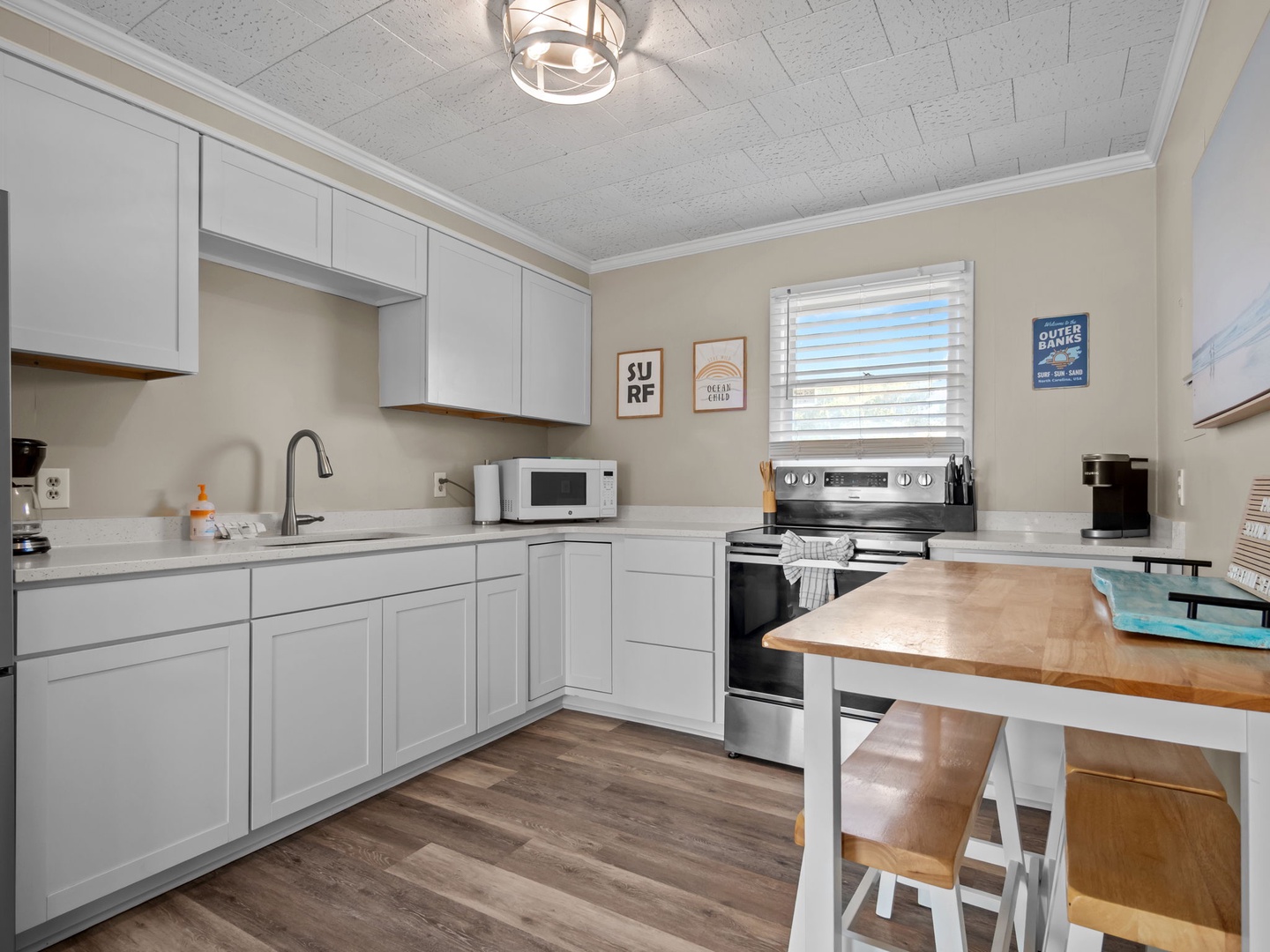 Your bright kitchen features modern appliances and ample counter space, perfect for preparing meals during your stay.