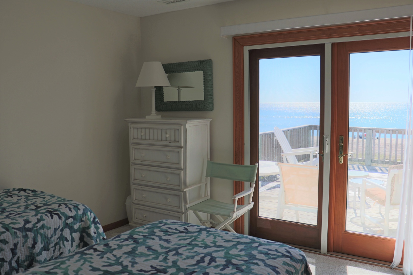 Wake up to stunning ocean views from your cozy bedroom, then step onto your private balcony for morning coffee.