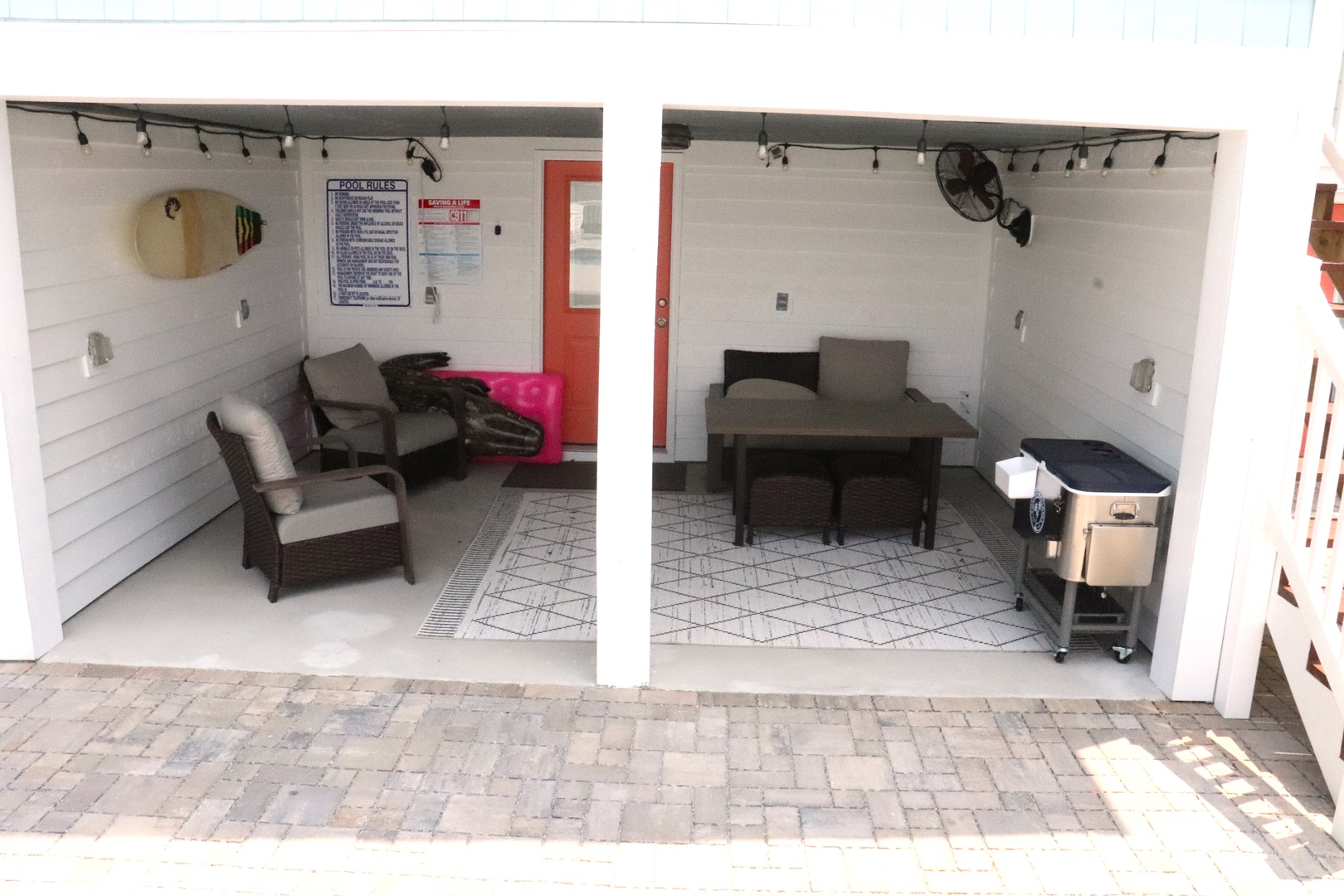 Relax in your private covered patio with comfortable seating, dining table, and convenient mini-fridge for refreshments.