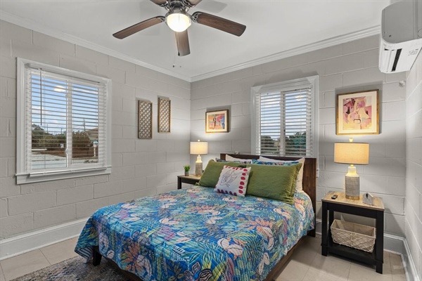 Drift into peaceful sleep in your comfortable bedroom, featuring a cozy ceiling fan and thoughtful touches that make you feel right at home.