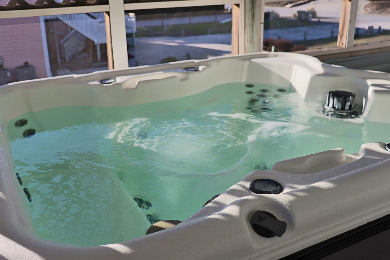 Sink into pure relaxation in your private hot tub, where therapeutic jets and warm bubbling water melt away stress.