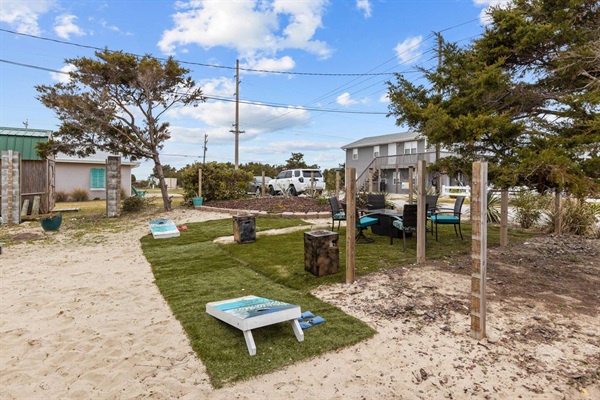 Unwind in your private beachside retreat with sun loungers perfectly positioned on lush grass patches for ultimate relaxation.
