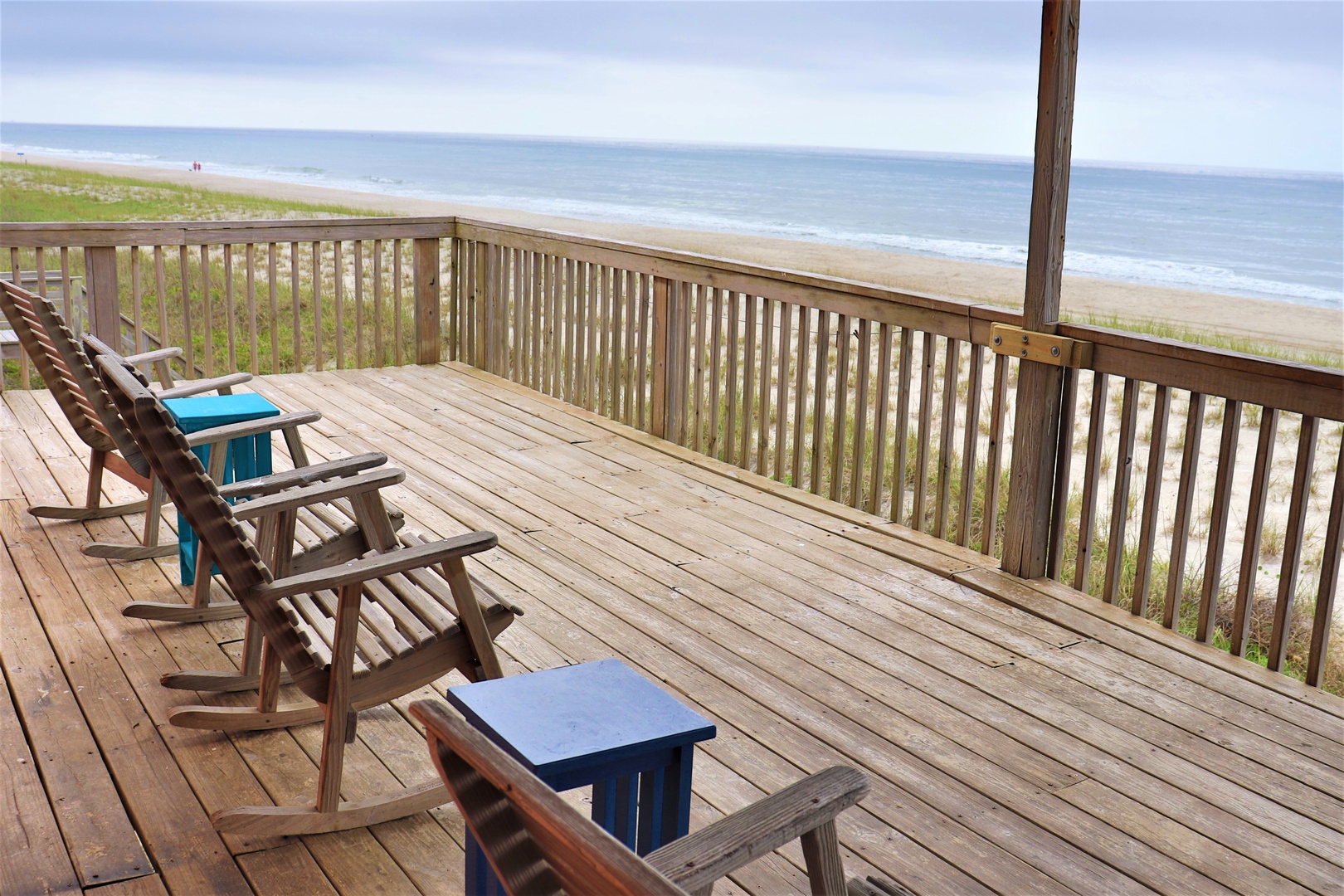 Relax on your private deck with stunning ocean views, where morning coffee tastes better with endless beach scenery stretching before you.