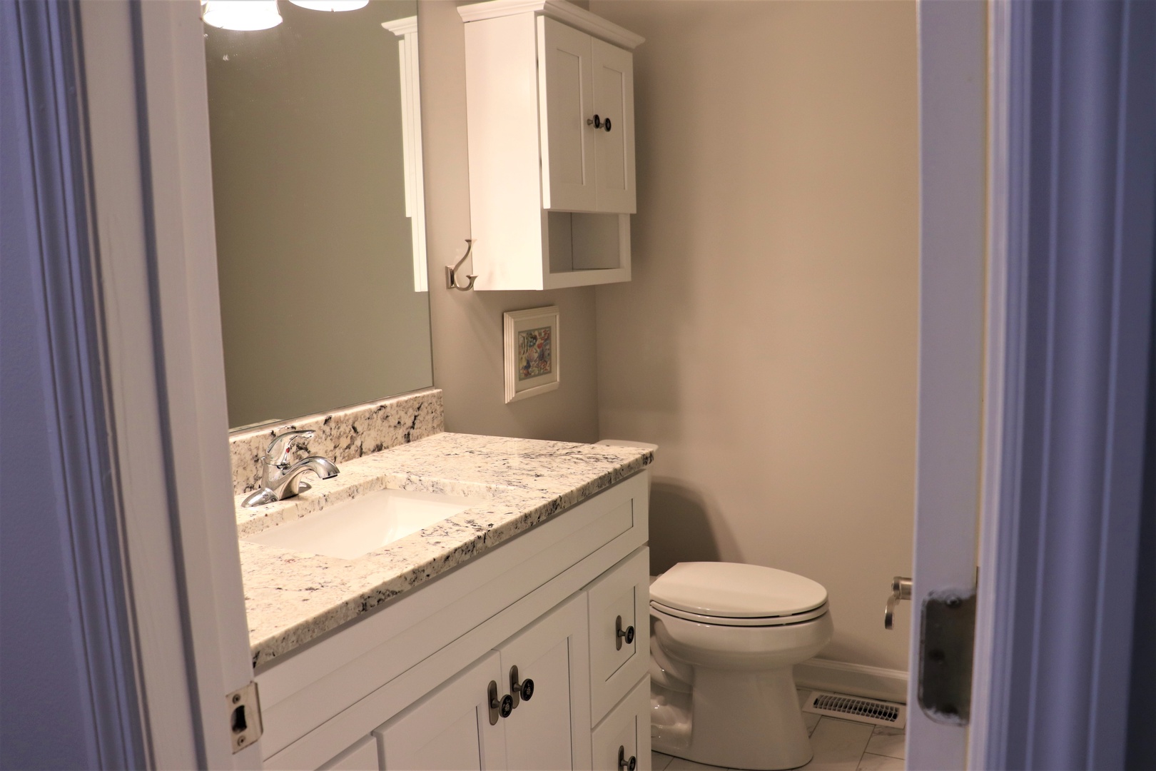 Your private bathroom features granite countertops, ample storage, and thoughtful touches to make you feel right at home.