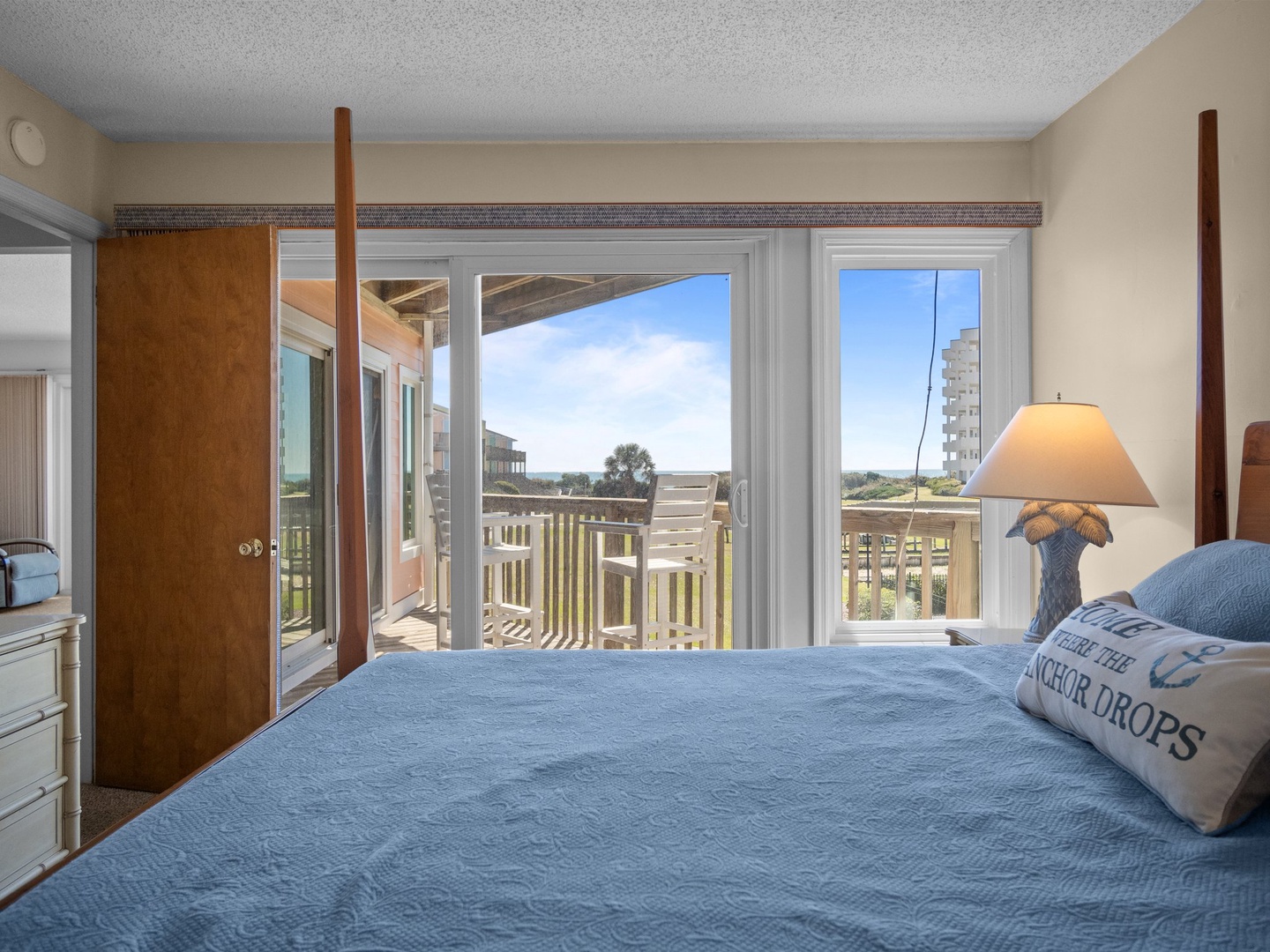 Wake up to stunning coastal views from your comfortable bed, with sliding doors opening to your private balcony overlooking the ocean.