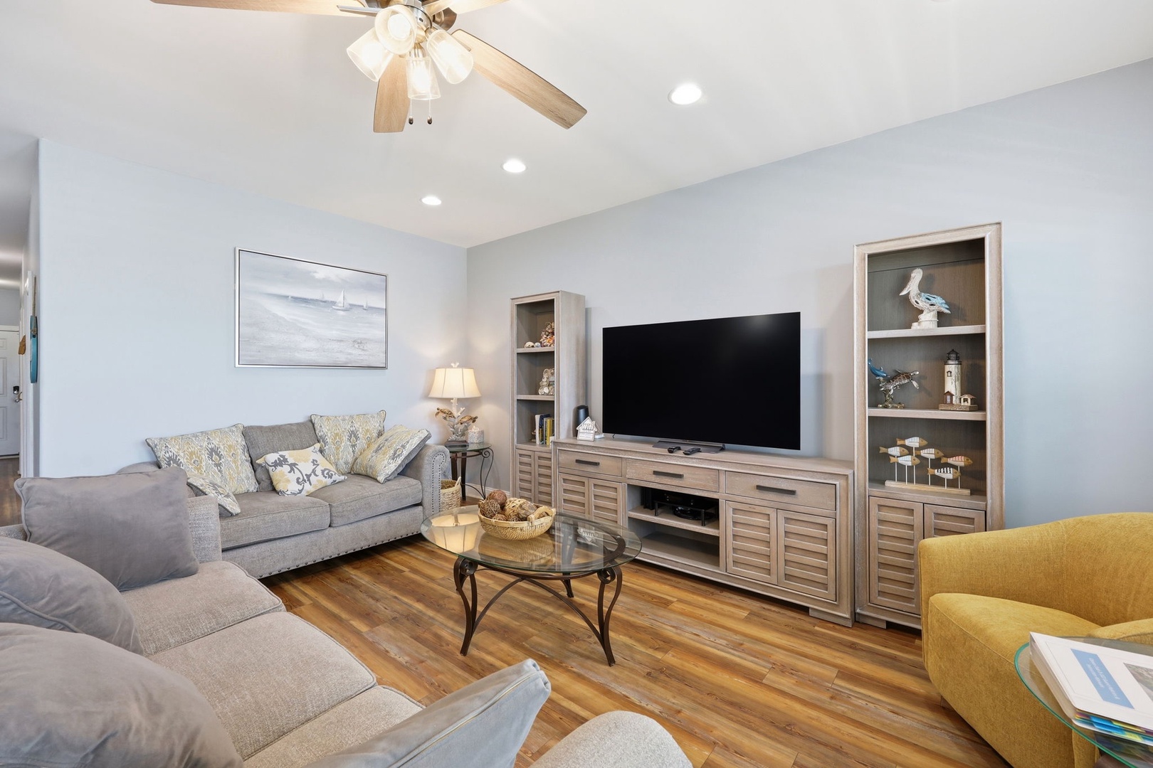 Sink into plush sofas and enjoy your favorite shows on the big screen—this living room is your home base for unwinding after a day of adventure.