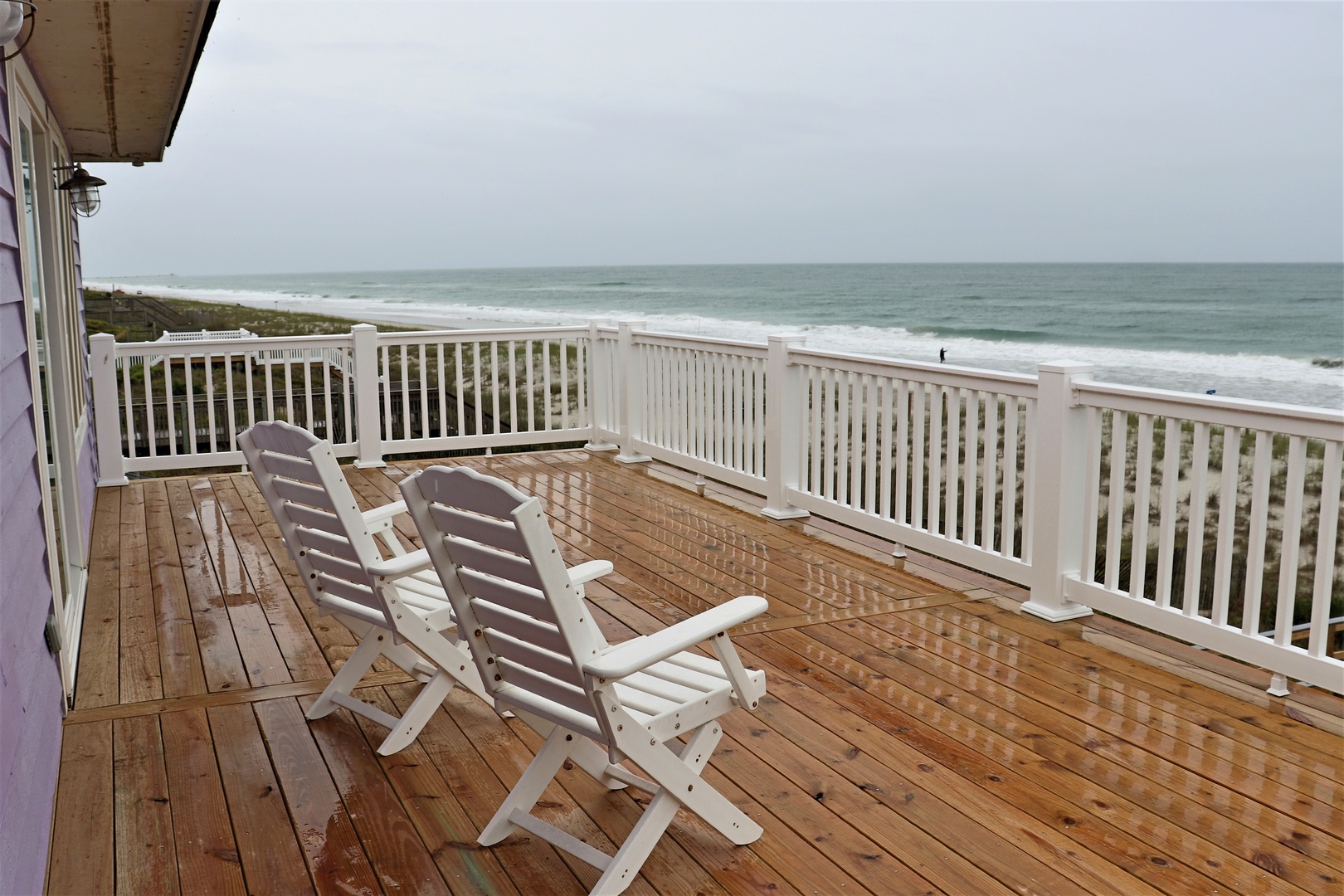 Step onto your private deck and sink into comfortable chairs while watching endless ocean waves roll onto the pristine coastline below.