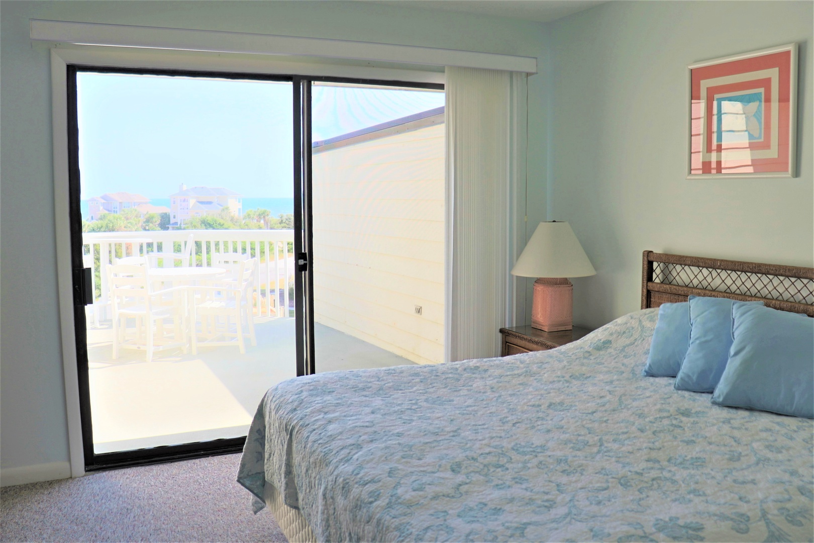 Wake up to peaceful mornings in your bright bedroom with sliding doors that open to your private balcony.