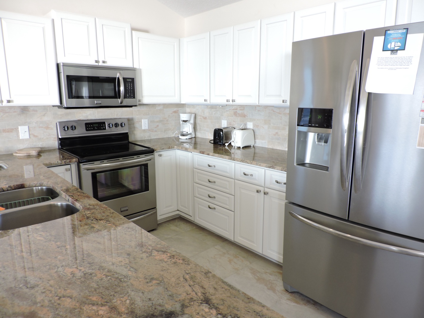 Your fully-equipped kitchen features granite counters, stainless appliances, and everything needed to prepare meals during your stay.