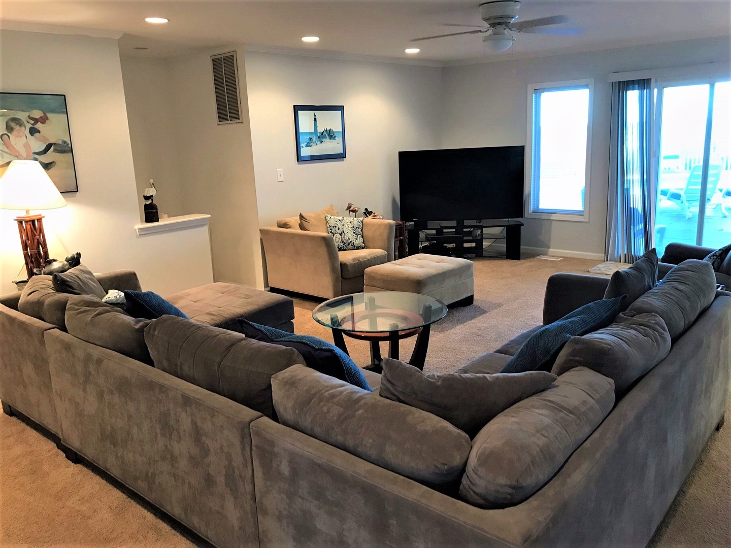 Sink into plush sectional seating perfect for movie nights. The spacious living area features modern entertainment and cozy spots for your group to unwind together.