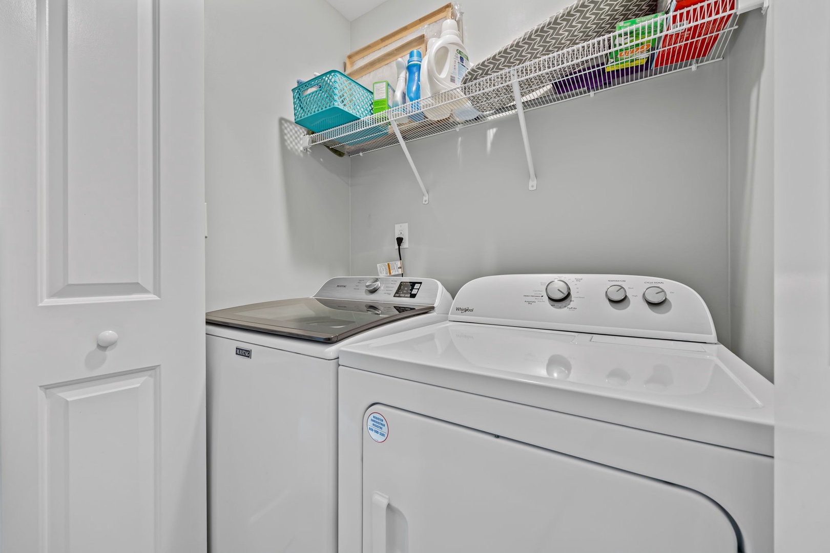 Your dedicated laundry room keeps your clothes fresh with a full-size washer and dryer, plus organized storage shelving for all your laundry essentials.