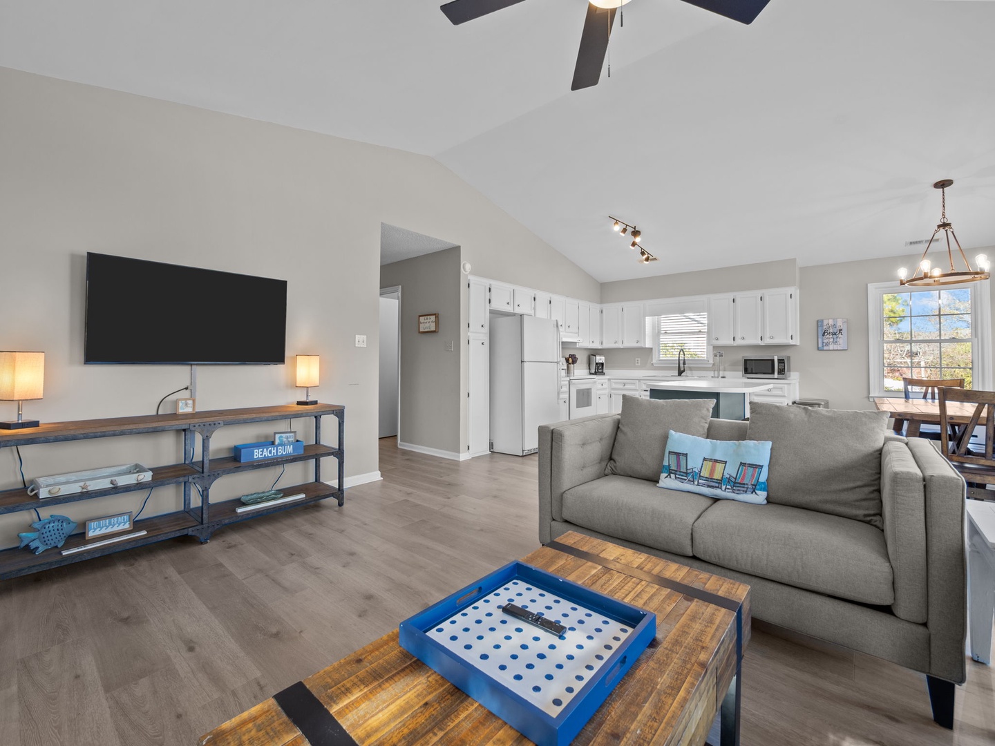 Relax in this bright, open living space where modern comfort meets coastal charm—your perfect home base for beach adventures.