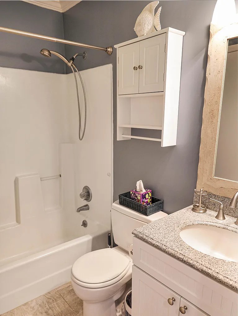 Refresh in your private bathroom with granite counters, tub-shower combo, and thoughtful amenities for comfort.