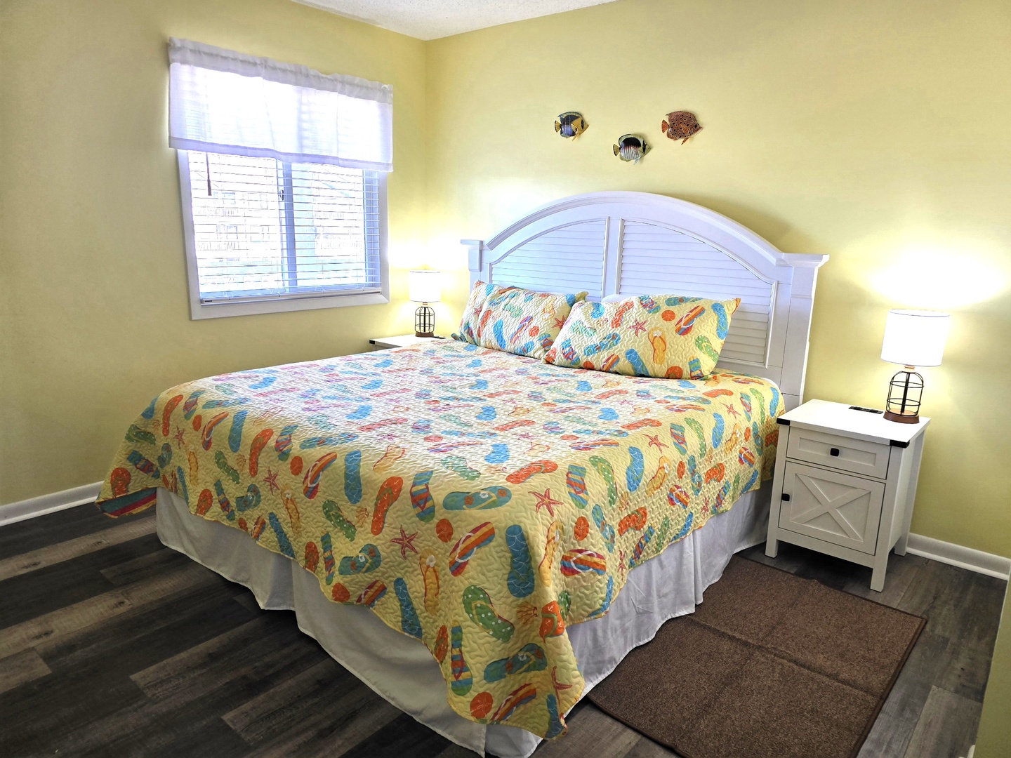 Drift off to peaceful sleep in your cheerful bedroom with vibrant bedding and gentle natural light streaming through your window.