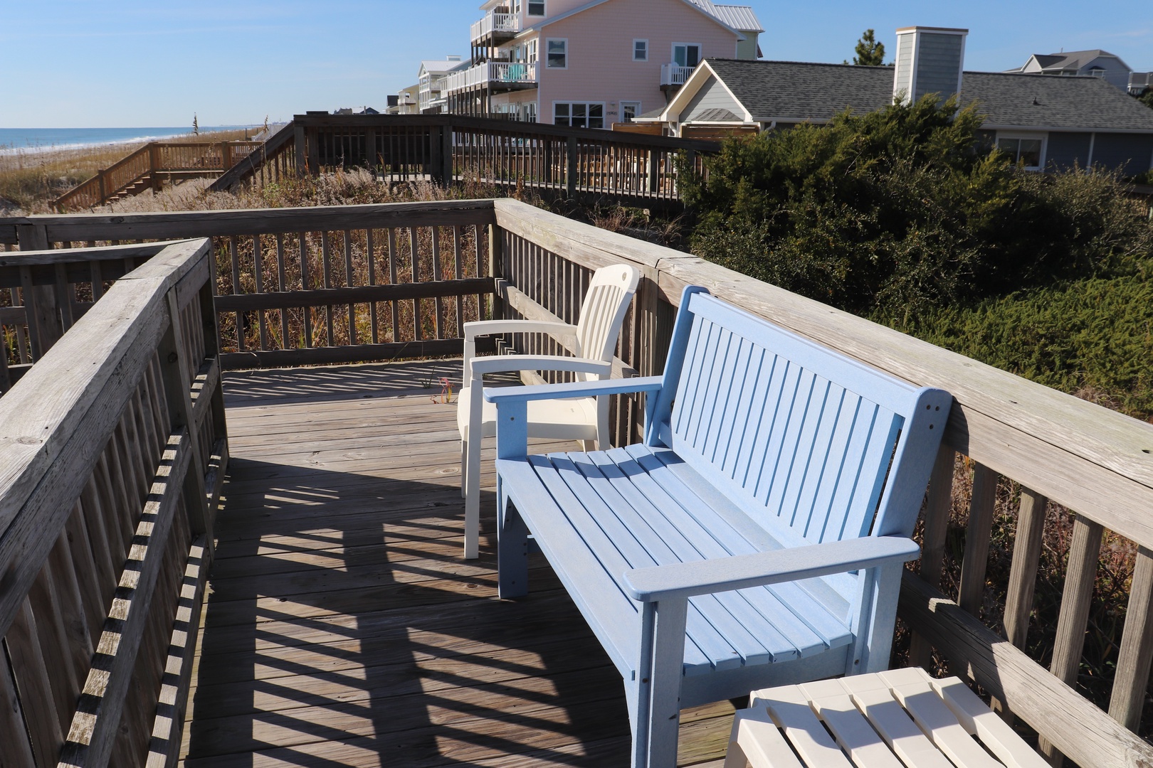 Relax on your private deck with ocean views, complete with comfortable seating where you can unwind and soak in coastal breezes.